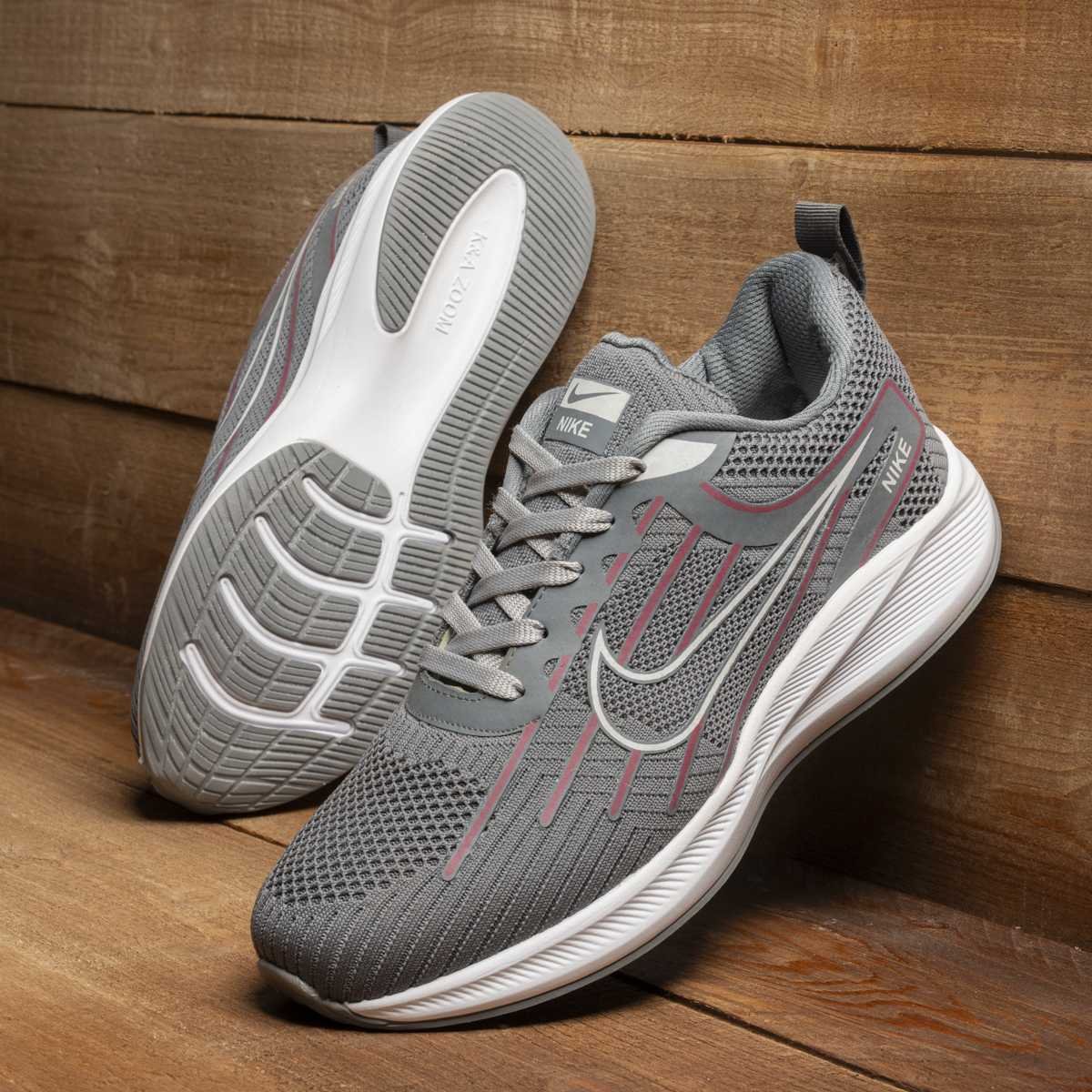 كوتشي Nike ايڤا O103 - رمادي (مخزن 16)